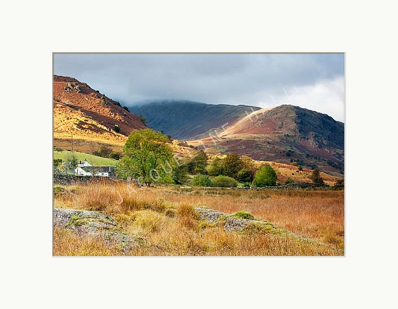 Autumnal colours of the fells at Little Langdale, Lake District. Shown with a white mount