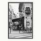 A black and white photograph of the corner of a Le Buci cafe in the Quartier Latin district in Paris. Shown with a double mount of black on the bottom and white on top. 